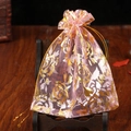 Pink organza gift bag with gold rose pattern and drawstring for jewelry packaging - Pink