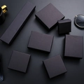Various matte black jewelry gift boxes for rings and necklaces on dark background - Black Gift Box (7x9x3cm)