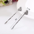 Lot de deux pinces à cheveux coeur argentées avec strass, longueur 5cm et largeur 0,7cm - Cœur Noir Fusil / Lot de 2