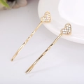 Close-up of golden hair clips with heart design and colorful rhinestones in a pair - Heart Gold / 2Pcs/Set