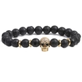 Mens 8mm black volcanic stone beaded bracelet set with gold skull and zircon accents - Lava Rock Skull Beaded Bracelet