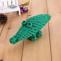 Handwoven cotton rope pet toy in a green crocodile shape for dog dental cleaning - Crocodile