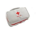 Portable grey first aid kit with red zipper and top handle for personal safety - Off-White