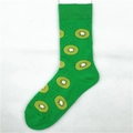 Vibrant green crew socks featuring a repeated kiwi fruit slice pattern and ribbed cuffs - Kiwi (1300C)