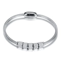Zilveren 3mm slangenketting armband met vijf micro-strass en magnetische sluiting - Staalkleur