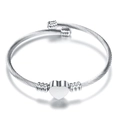 Polished silver heart pendant on a cable wire open bangle with ball ends - Steel