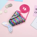 Close-up of mermaid tail coin purse with rainbow sequins and silver laser fin detail - Multicolor