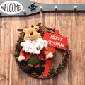 Christmas wreath with Santa Claus doll and Merry Christmas sign on wooden background - Large Sign Wreath A (Santa MERRY CHRISTMAS)