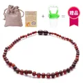 Natural Baltic amber baby necklace in dark red with linen bag and certificate - Matte Blood Amber Style
