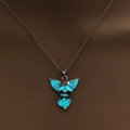Luminous winged skull pendant necklace with glowing cyan light effect on dark background - Antique Silver + Blue Green (Skull Wings)