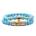 Men's 8mm blue marble bead bracelet set with golden skull and textured cross tube - Turquoise Beaded Bracelet Set