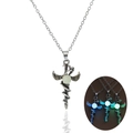 Luminous dragon cross pendant showing glowing effect in the dark and silver finish detail - Antique Silver + Blue Green (Dragon Sword)