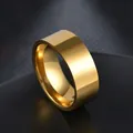 Macro shot of wide gold stainless steel band with polished mirror finish for men - US 8 / Gold
