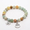 Dettaglio perline di amazzonite 8mm con ciondoli albero della vita e fiori d'argento - Amazonite