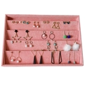 Pink velvet jewelry organizer tray filled with various alloy earrings and pearl studs - Notched Tray