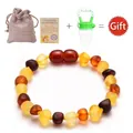 Baltic amber baby teething bracelet set with linen pouch and green silicone feeder - Frosted Multi-color