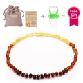 Natural Baltic amber baby necklace set with linen pouch and certificate on white base - Matte Rainbow Style