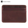 Detailed close-up of brown oil wax leather card holder with premium orange stitching - Coffee