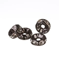 Detailed macro view of four black metal spacer beads with inlaid clear crystals for DIY - 6mm / Gun Black + Black Rhinestone