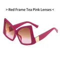 Oversized bow-shaped sunglasses with deep red frames and tea pink gradient lenses - Red Frame Tea Pink Lenses