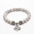 White howlite beaded bracelet featuring a silver tree of life charm and marble textures - Howlite