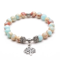 Lava stone bead bracelet with turquoise beads and a silver-tone Tree of Life charm - Natural Stone