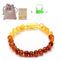 Baltic amber baby bracelet with gradient beads, linen pouch, and certificate set - Frosted Rainbow