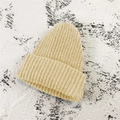 Minimalist kids warm knitted wool beanie hat in light khaki color for autumn and winter - Beige