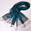Dark teal silk scarf with glitter effect and dark grey tassels on a white background - Lake Blue