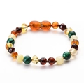 Natural amber baby bracelet with turquoise beads on a clean white background - Malachite Multicolor Bracelet