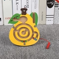 Yellow pear-shaped wooden magnetic maze toy with colorful beads and a red stylus pen - Pear