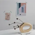 Modern ring-shaped beige ceramic vase with a matte finish and hollow geometric design - Lying Mountain (Beige)