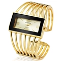 Detail of a golden cuff watch for women with hollowed-out strap and rectangular quartz dial - Gold Gold Face