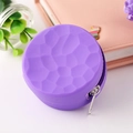 Purple round silicone coin purse with honeycomb texture and secure zipper closure - Violet