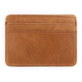 Detailed view of genuine leather card holder with hand-stitched edges and brown texture - Yellow Brown