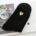 Thick black crew socks for women featuring a delicate gold heart embroidery detail - One Size / Black