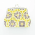 Detail of vintage Moroccan coin purse with yellow geometric sun pattern and metal clasp - Yellow and Purple Geometric Sun Pattern