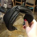 Elegant black satin twist headband featuring a wide-brimmed fabric design for women - Black
