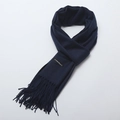 Navy blue cashmere scarf with elegant fringe detail and classic product label - Navy Blue