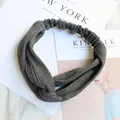 Dark grey knitted twisted headband with a ribbed texture and elastic back band - Knitted Dark Grey