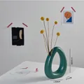 Modern emerald green ceramic donut vase with dimensions 20x5.5x16cm for home decor - Standing Mountain (Peacock Green)