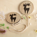Macro detail of wooden magnetic curtain tieback with deer cutout and braided cotton rope - No.3 Reindeer (Light Coffee)