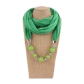 Detailed view of bohemian style fabric scarf necklace with green beads on a mannequin - 180x40cm / Green