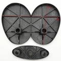 Close-up of black plastic Christmas doll telescopic rod base parts with size markings - 904 Conjoined Twins 20*14