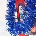 Blue tinsel garland decoration with metallic shine for festive party celebration ornaments - Blue