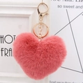 Close-up of a pink heart-shaped plush keychain with a gold metal clasp and chain - Dusty Pink