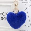 Close-up of blue heart plush keychain with golden metal ring and lobster clasp - Sapphire Blue