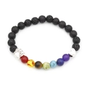 Detailed close-up of chakra beaded bracelet featuring lava stone and silver paw charm - Black Lava Rock/Silver Accessories