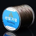1.2mm dark brown elastic beaded cord on a transparent reel for DIY bracelet making - 0.8mm / Coffee
