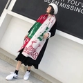 Winter knitted Christmas scarf in red, green and white with Merry Christmas text - Beige